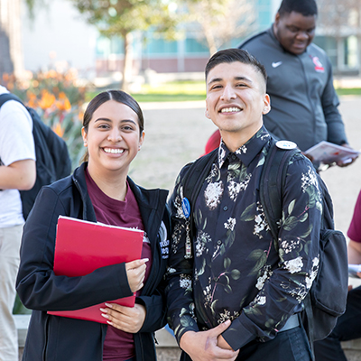 two college students smiling